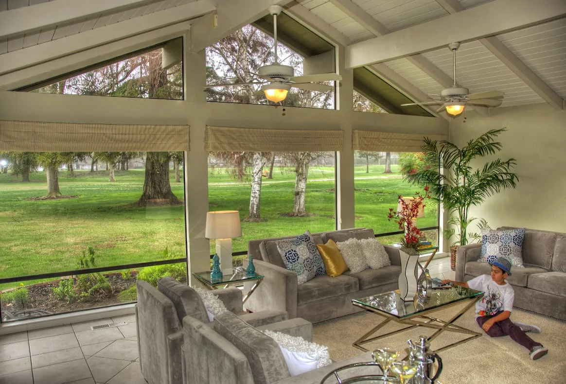 A beautifully staged living room with neutral palette